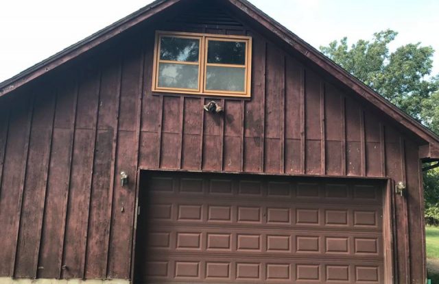 garage with old siding