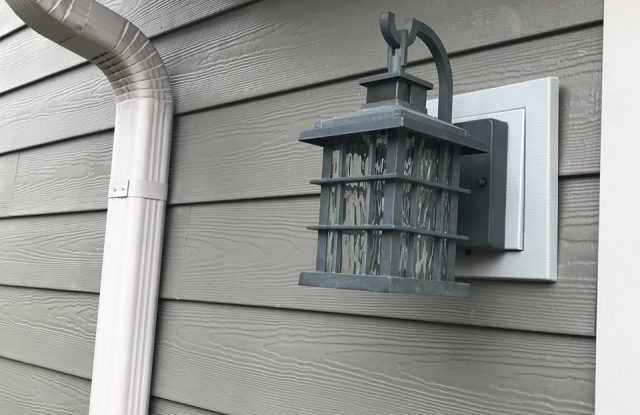 siding detail around exterior light