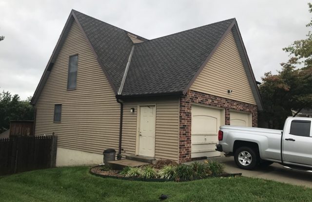 garage with old siding