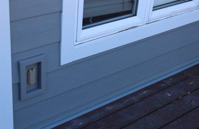 siding next to deck