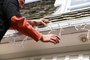 How to safely hang Christmas lights and protect your roof