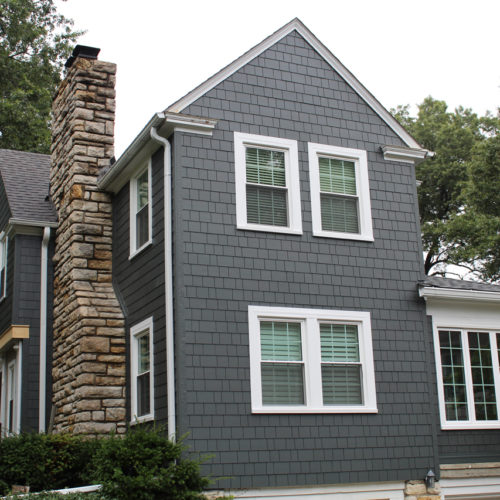 James Hardie Siding in Iron Gray with Arctic White trim installed on a Fairway, KS home by Smart Exteriors