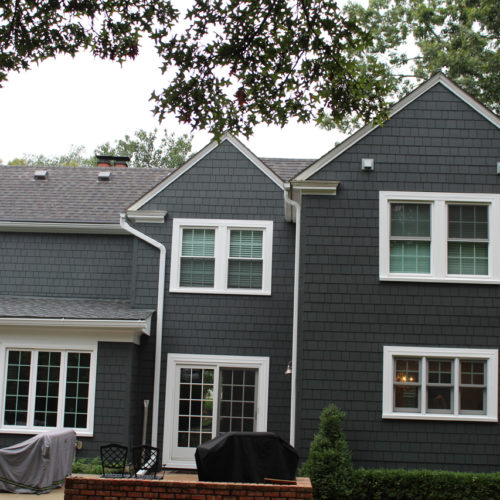James Hardie Siding in Iron Gray with Arctic White trim installed on a Fairway, KS home by Smart Exteriors