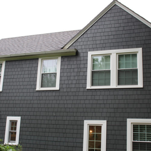 James Hardie Siding in Iron Gray with Arctic White trim installed on a Fairway, KS home by Smart Exteriors