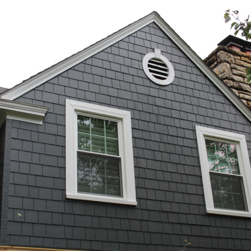James Hardie Siding in Iron Gray with Arctic White trim installed on a Fairway, KS home by Smart Exteriors