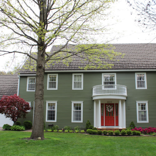 Home with olive green James Hardie Siding installed by Smart Exteriors in Overland Park, Kansas