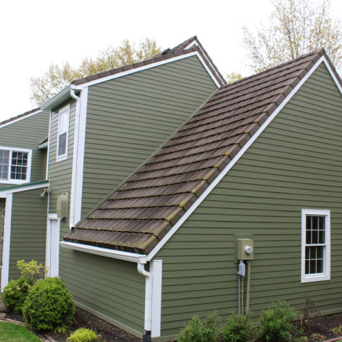 Home with olive green James Hardie Siding installed by Smart Exteriors in Overland Park, Kansas