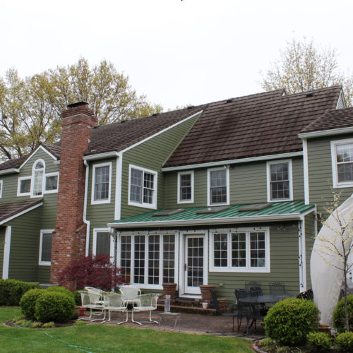 Home with olive green James Hardie Siding installed by Smart Exteriors in Overland Park, Kansas