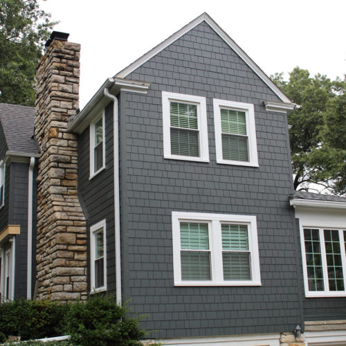 James Hardie Siding in Iron Gray with Arctic White trim installed on a Fairway, KS home by Smart Exteriors