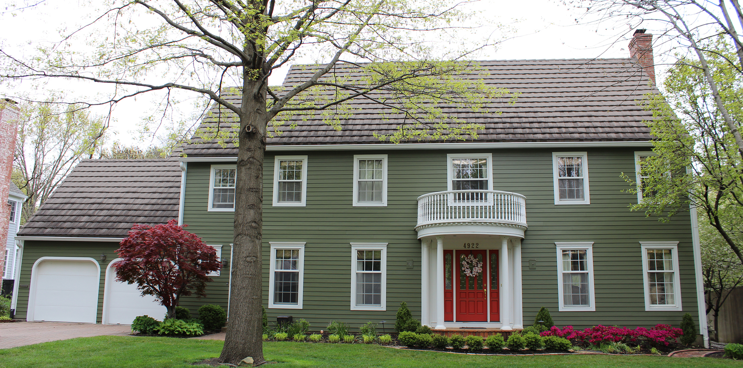 Home with olive green James Hardie Siding installed by Smart Exteriors in Overland Park, Kansas