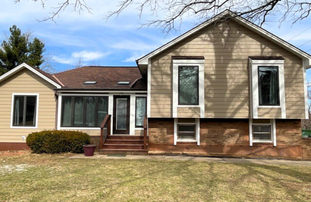 Beautiful new James Hardie siding transformation on a Missouri split level by Smart Exteriors.