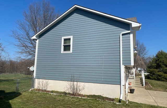 Summit, MO home with new James Hardie Siding & ProVia Windows installed by Smart Exteriors