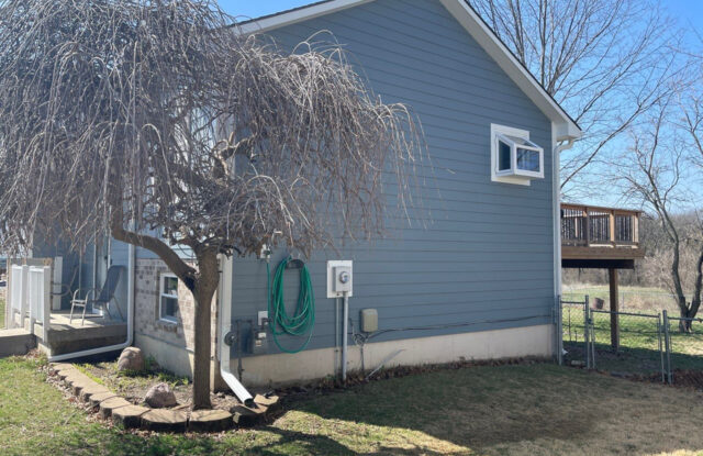 Summit, MO home with new James Hardie Siding & ProVia Windows installed by Smart Exteriors