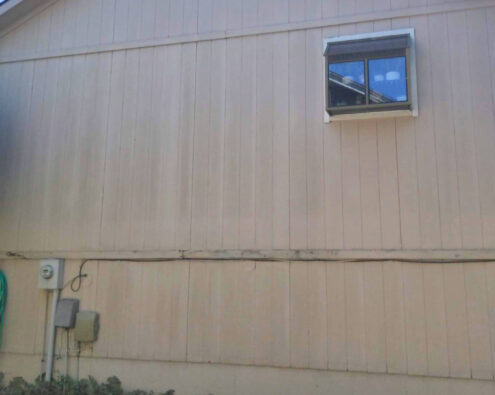 Damaged siding before client get's a siding replacement by Smart Exteriors.