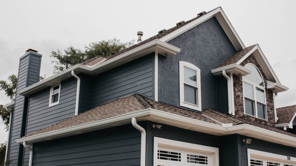 Home exterior painted blue with white trim