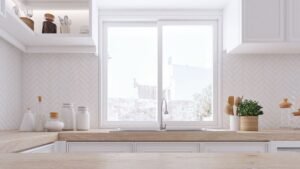 Slider window installation in kitchen by Smart Exteriors.