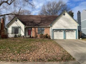 Smart Exteriors installs new Arctic White James Hardie Siding on Overland Park Home