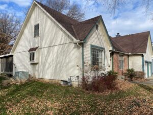 Smart Exteriors installs new Arctic White James Hardie Siding on Overland Park Home