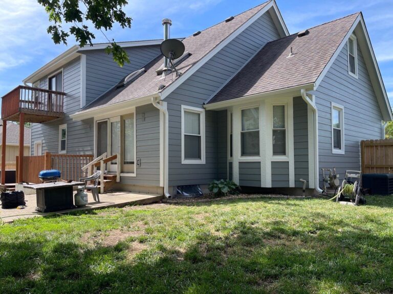 Lee's Summit home with newly installed siding & gutters